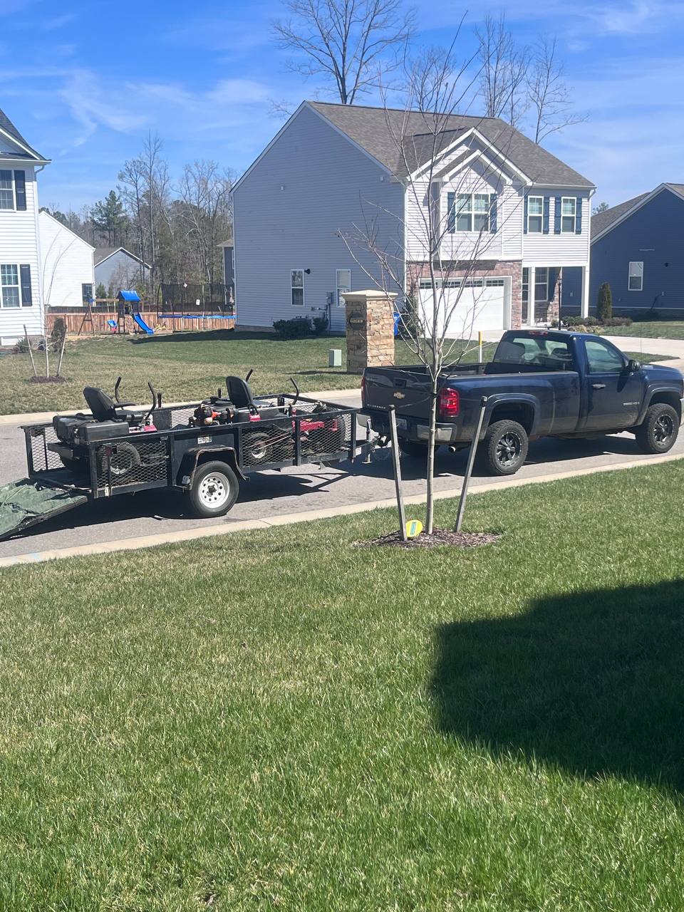 Capitol City Lawncare truck and equipment trailer